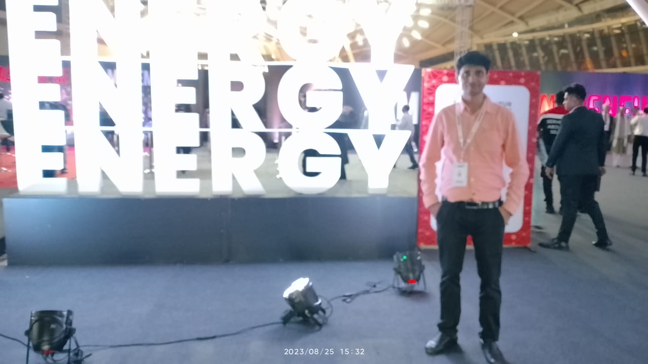 Avnish Pandey at a celebration event with a distinguished guest